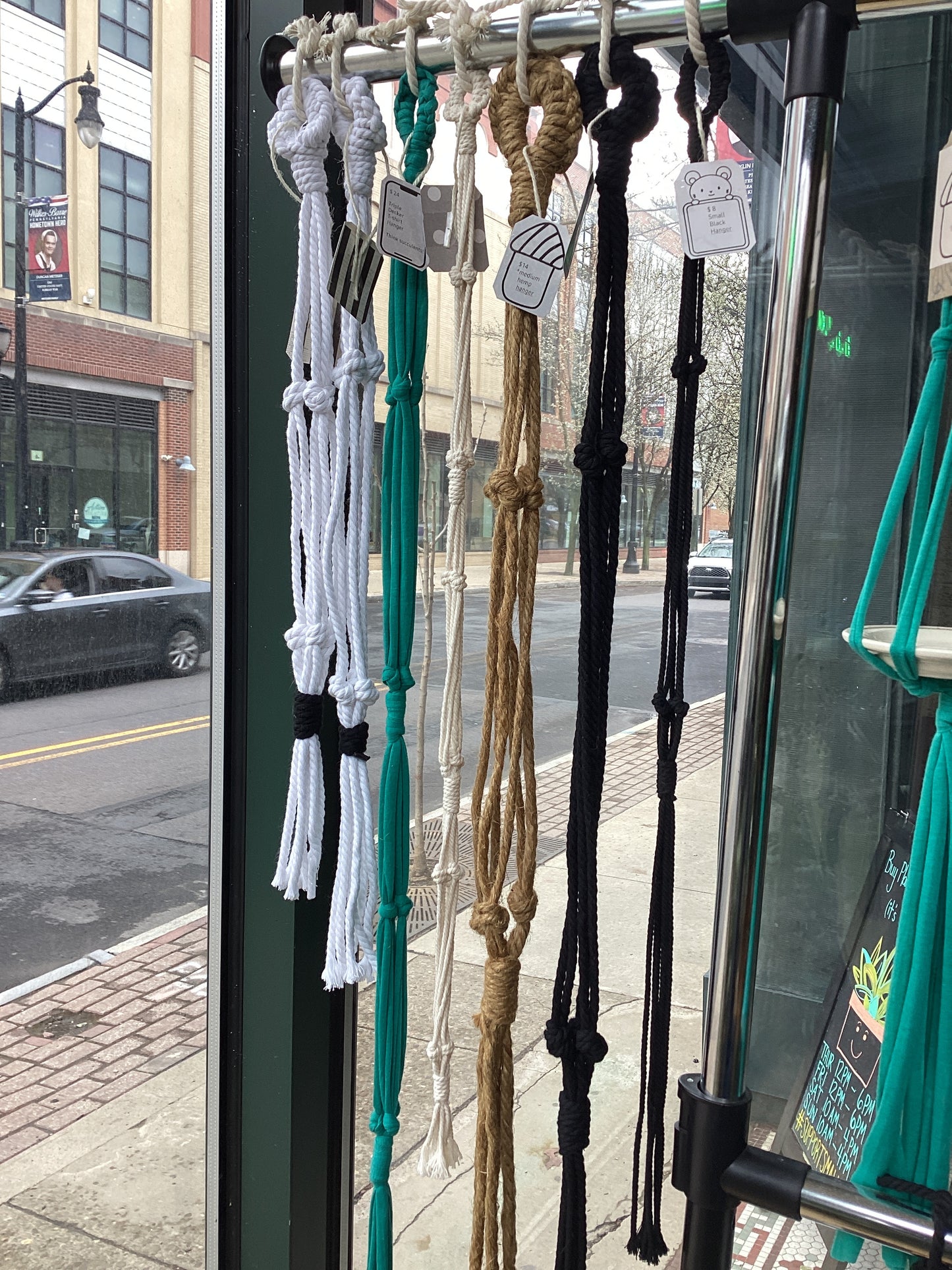 Empty macrame hangers by Kristin