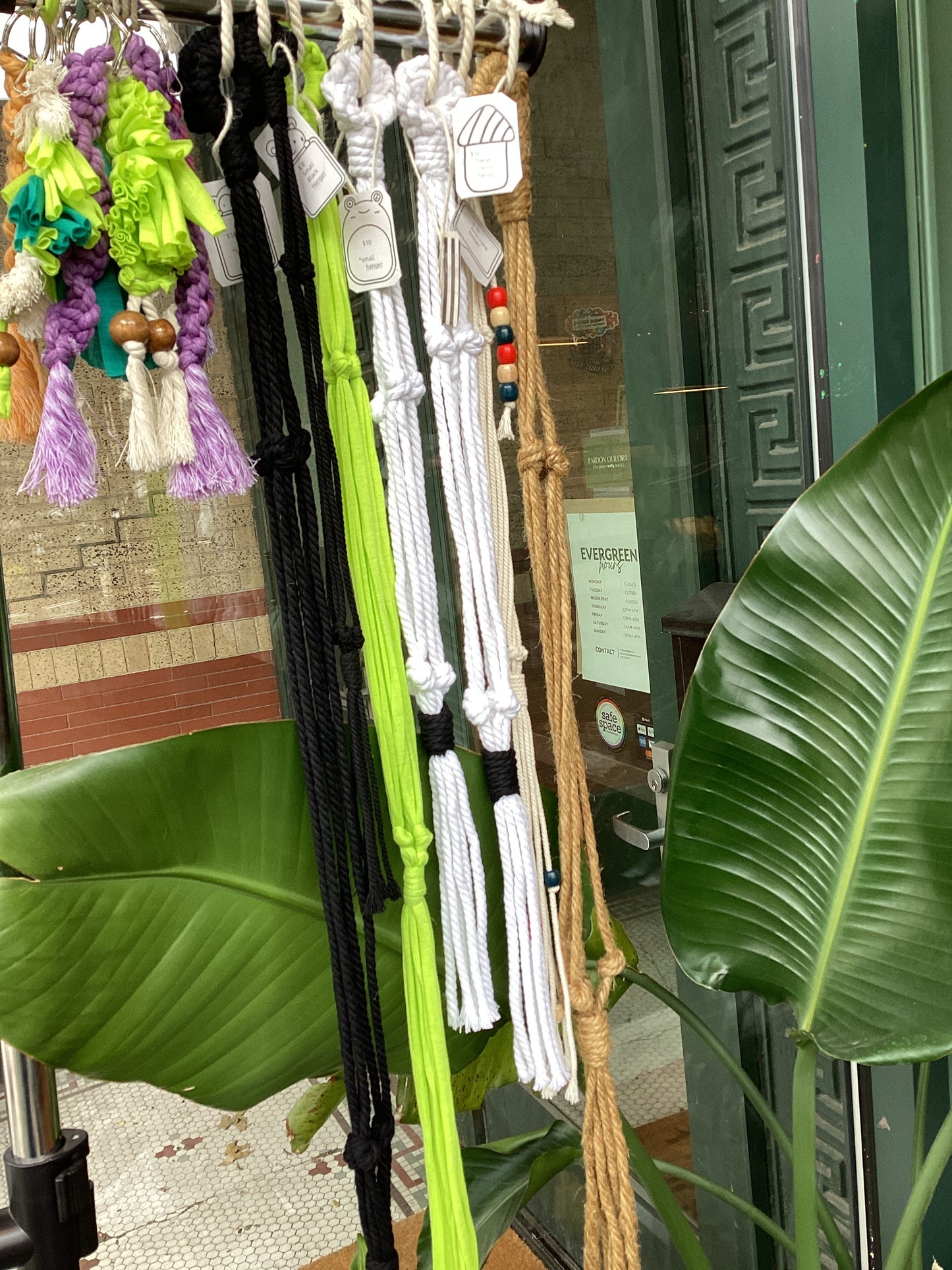 Empty macrame hangers by Kristin
